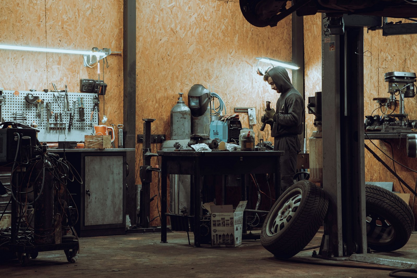 Shop owner working at a bench